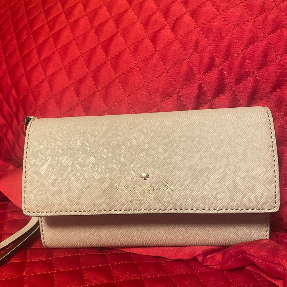 Kate Spade wallet and phone holder. Never used